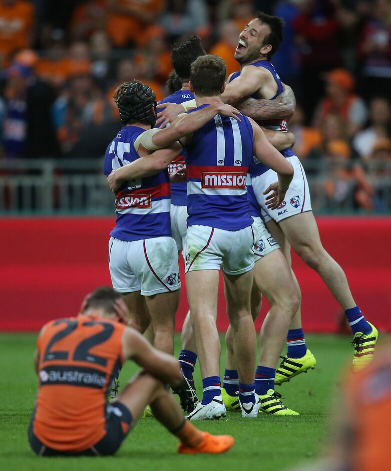 AFL 2016 First Preliminary Final - GWS Giants v Western Bulldogs SYDNEY, AUSTRALIA - SEPTEMBER 24: Tory Dickson of the Bulldogs celebrates a goal during the 2016 AFL First Preliminary Final match between the GWS Giants and the Western Bulldogs at Spotless Stadium on September 24, 2016 in Sydney, Australia. (Photo by Sean Garnsworthy/AFL Media)